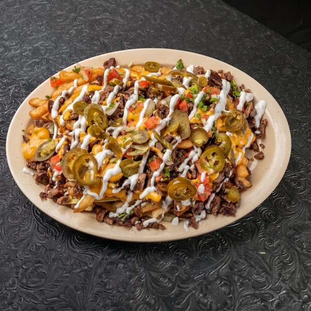 Papas con Asada / Asada Fries.